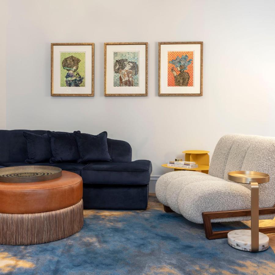 Virgin Hotels Edinburgh Ngoại thất bức ảnh A living room with a sofa, armchair and ottoman